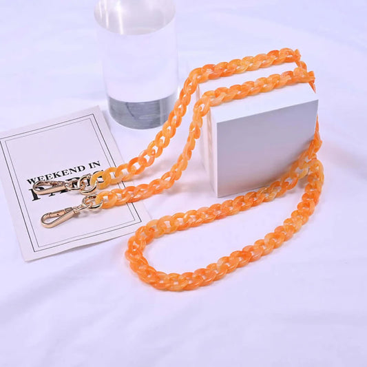 Folie à Trois  telefoonketting Destinations  orange